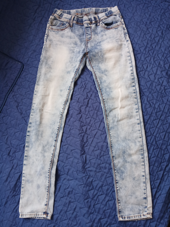 Svetlo plave uske teksas farmerke na lastis, M-L slika #1