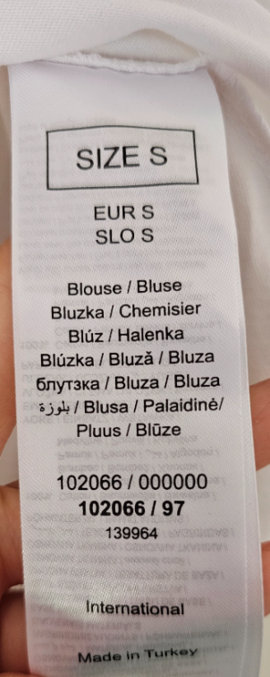 Orsay bela majica sa dekorativnim volanom slika #4